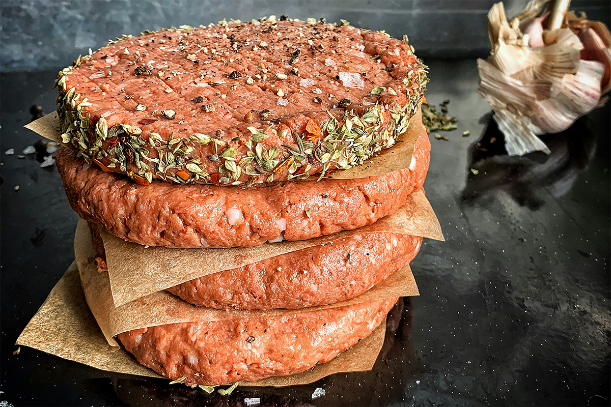 A stack of plant-based burgers