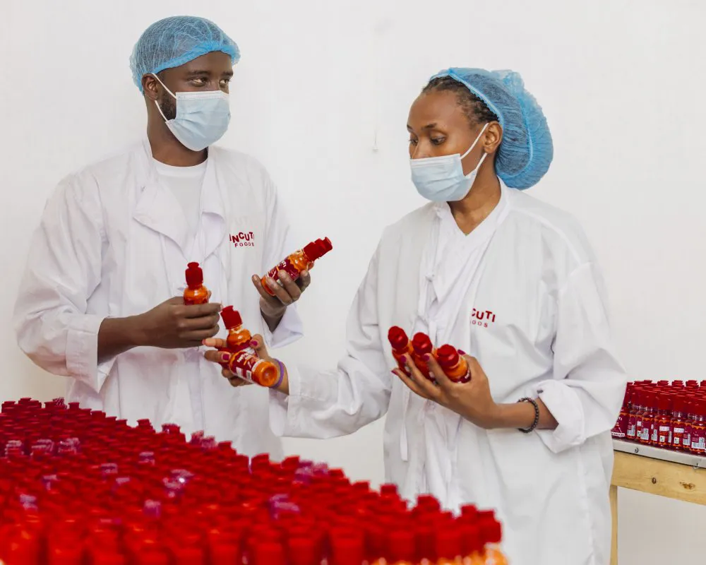 Incuti staff with some of the start-up’s signature chilli sauces