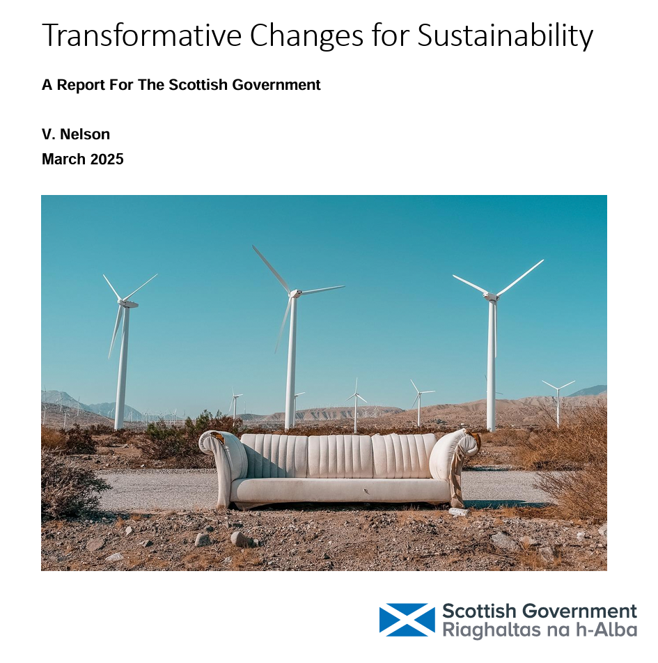Report cover by V. Nelson, March 2025. Title at top reads “Transformative Changes for Sustainability” in large text, with the subtitle “A Report For The Scottish Government” beneath it in bold. Photo shows an abandoned white sofa in the foreground and wind turbines across a barren landscape. Bottom right features the Scottish Government flag-and-wordmark with the Gaelic “Riaghaltas na h-Alba.”
