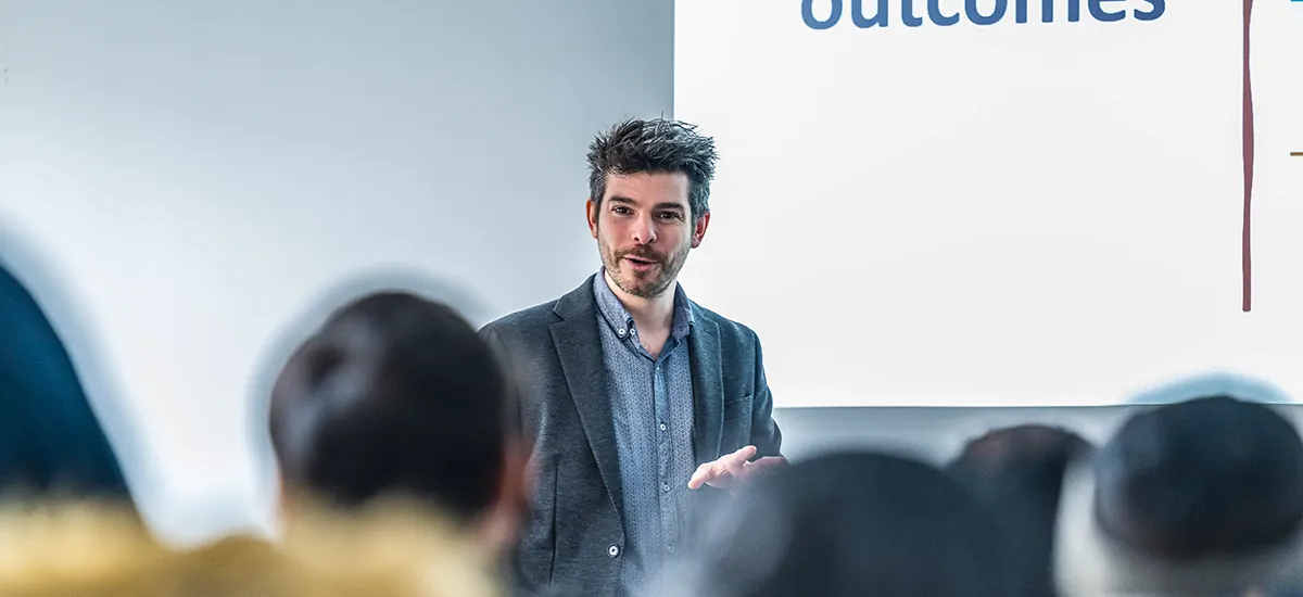 Andrew Armitage presenting to a class